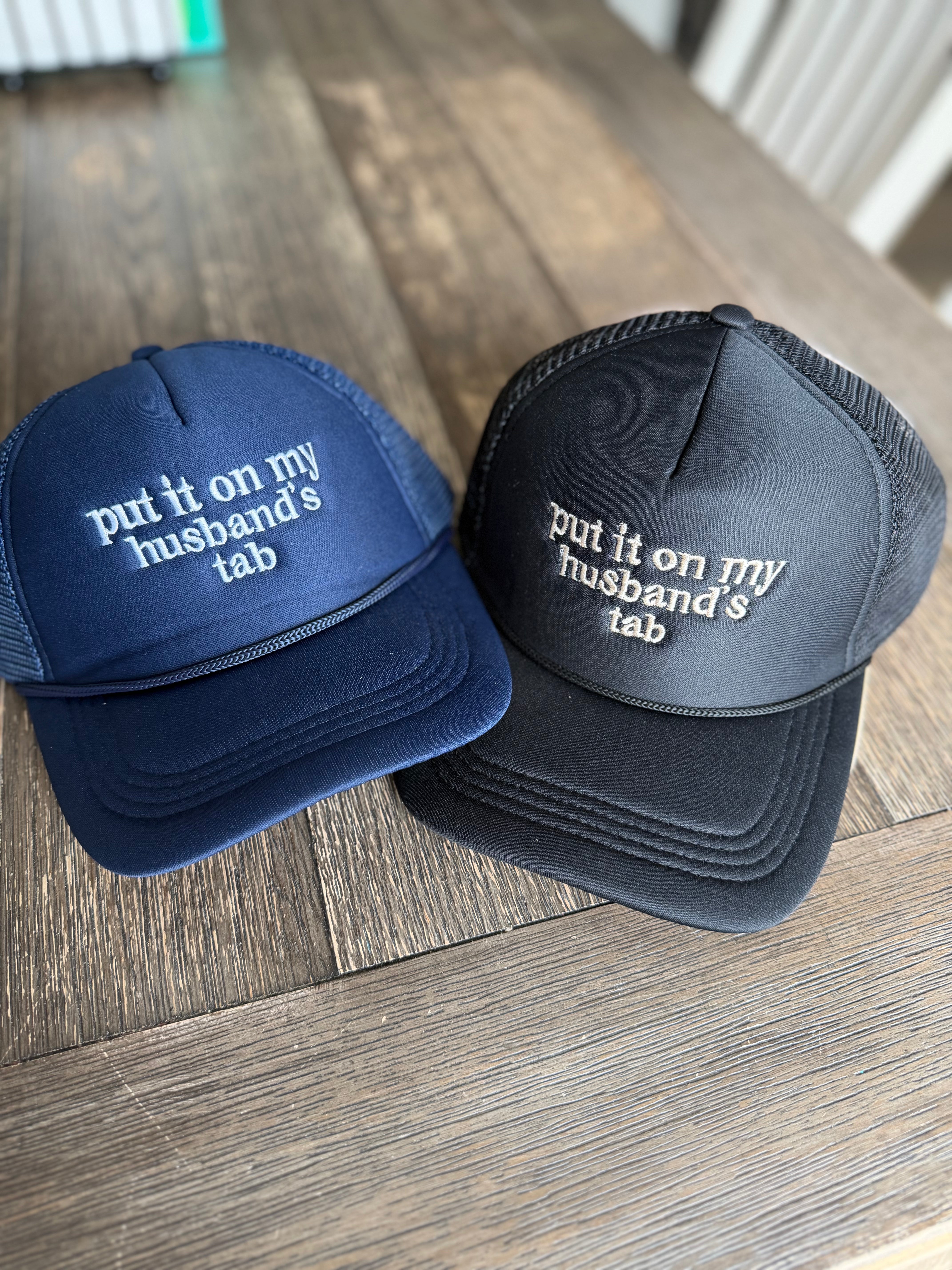 Put It On My Husband’s Tab Mesh Trucker Cap
