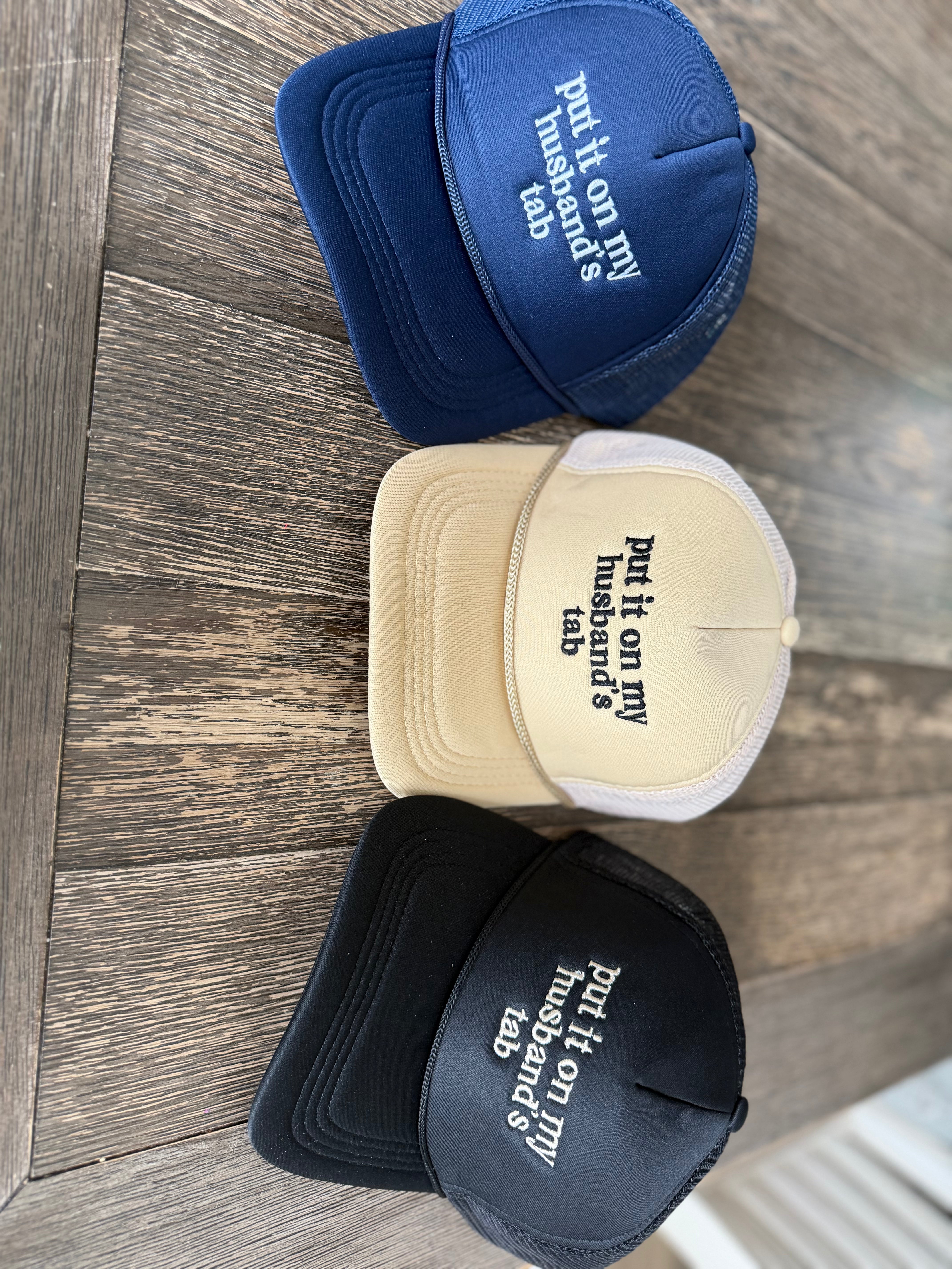 Put It On My Husband’s Tab Mesh Trucker Cap