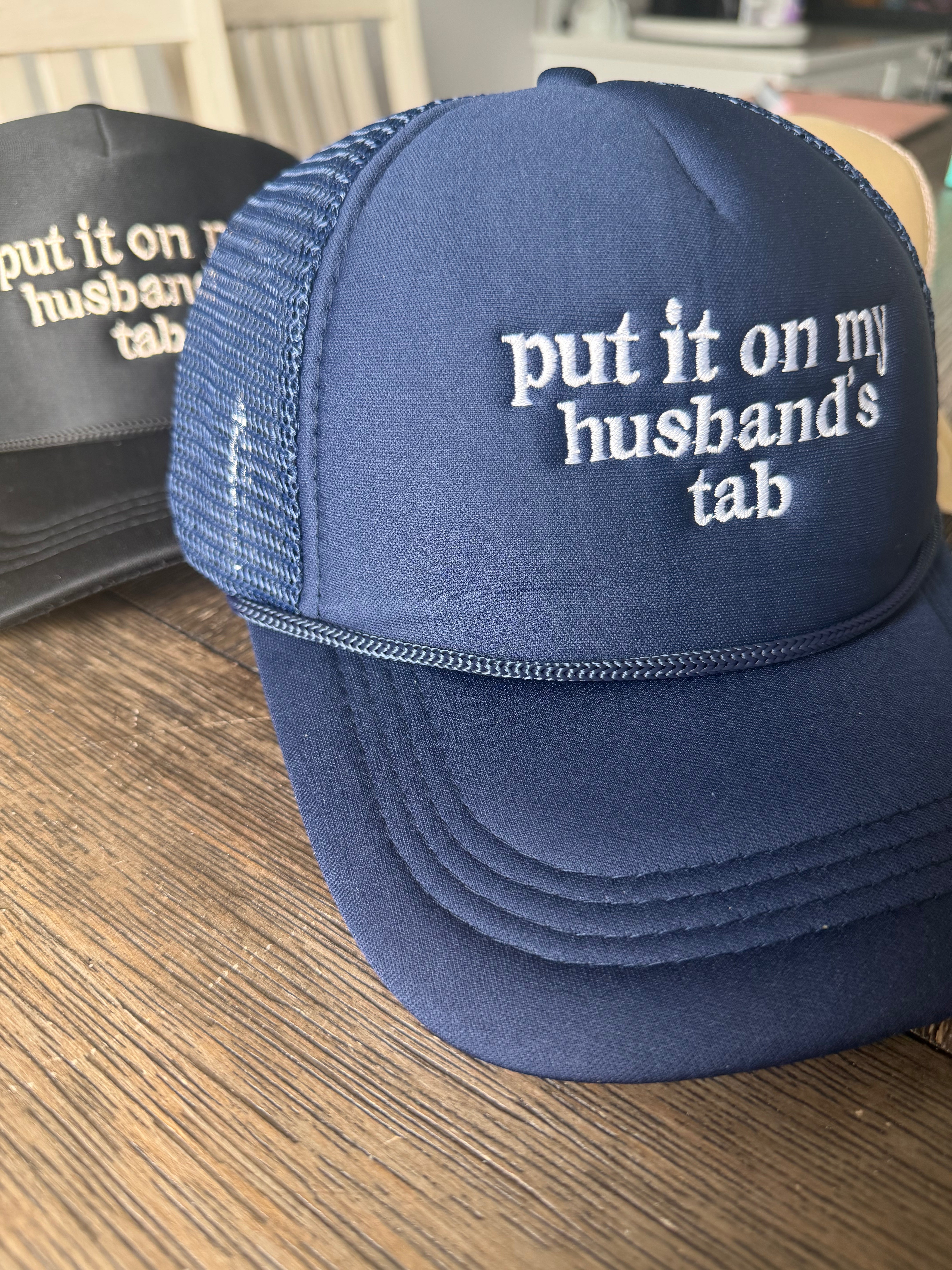 Put It On My Husband’s Tab Mesh Trucker Cap