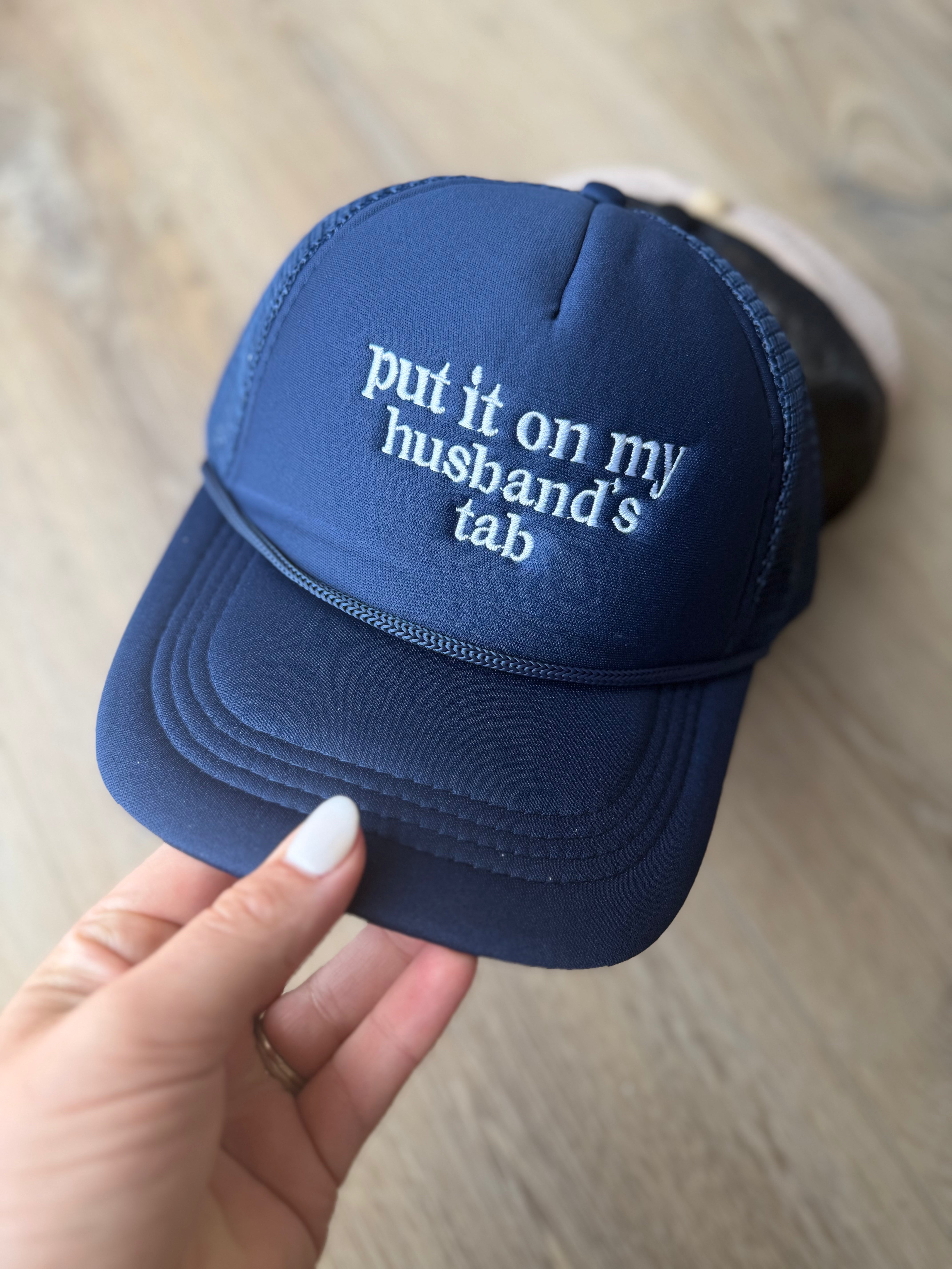 Put It On My Husband’s Tab Mesh Trucker Cap