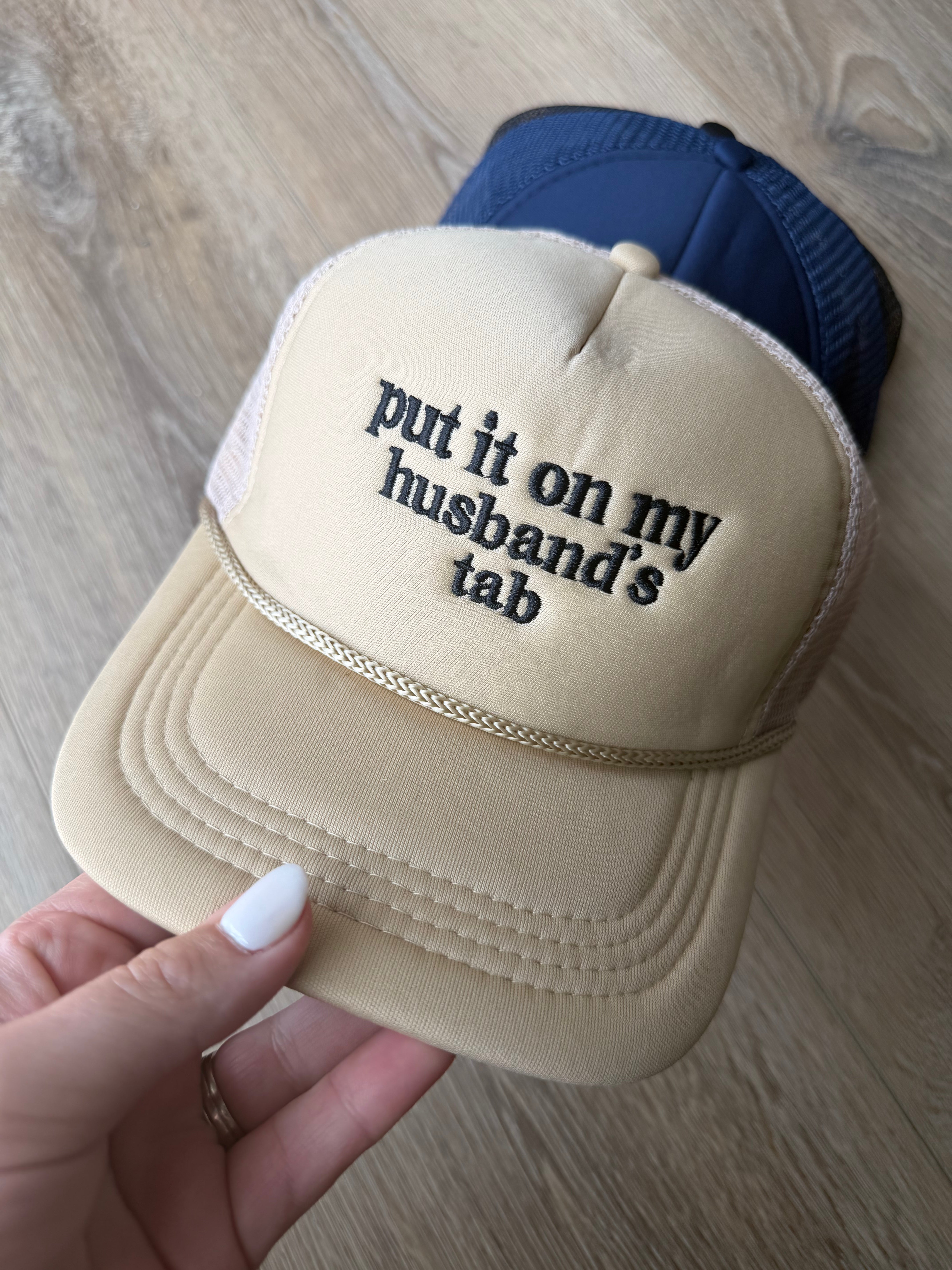 Put It On My Husband’s Tab Mesh Trucker Cap